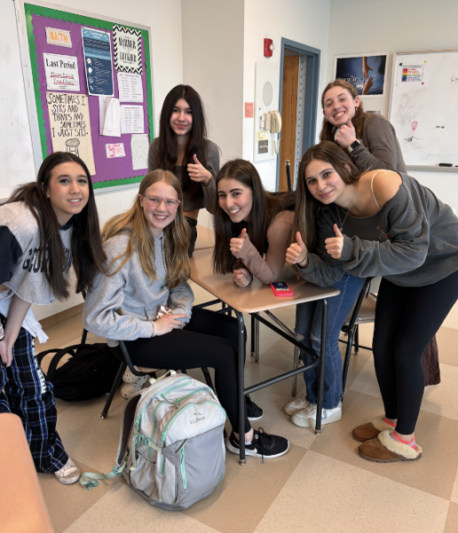 Girls Who Code meets biweekly. Activities include coding games, guest speakers, presentations, and bonding activities. Pictured are the two co-presidents (Stella St. Andre ’25 far right, Isabelle Khamish ’25 on her left) and other members of the club. 